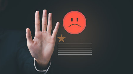 Rating rating concept and giving negative feedback ,Consumers rate poor quality of products and services ,dissatisfaction in business ,icon showing opinion angry or dissatisfied ,negative commentの写真素材