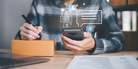 Startup or small business entrepreneur ,Make a note of delivery address from the customer ,order management in online stores , shopping on internet ,Selling online on the Internet ,SME ,e-commerceの写真素材