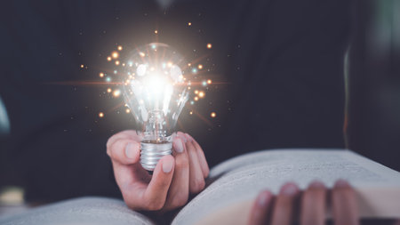 Concept of new ideas and innovation ,Innovative idea in businessman hand ,Connecting creativity with modern technology ,Finding new solutions to solve business problems ,Finding Creativityの写真素材