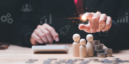 Businessman showing concept of planning and managing finances and investments ,profit growth management ,high return investment ,bank interest management ,risk management ,investment analysisの写真素材