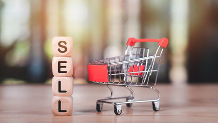 wooden blocks and shopping cart ,Consumer society ,Shopping service on online web and offers home delivery ,Connecting stores around the world ,shopping on the Internet ,online shoppingの写真素材