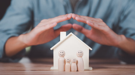 Men show concept of protection and protection of the family's safety ,Insurance management planning ,health care and finance ,property and family risk reduction ,life and property protection planningの写真素材