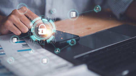 Businessman showing data access protection with key icon ,safety technology ,Data protection and privacy with encryption ,digital security unlocking or encryption ,virus protection and safety alertsの写真素材