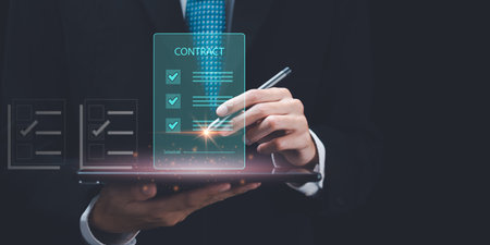 man checking contract documents online ,handle business documents and agreements, business cooperation and contract signing ,Inspection agrees on quality assurance ,Approval of checklist documentsの写真素材