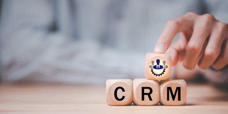 Businessman showing customer relationship management concept, CRM ,strategy or software to follow up on sales ,Customer relationship building ,creating satisfaction and confidence for customersの写真素材