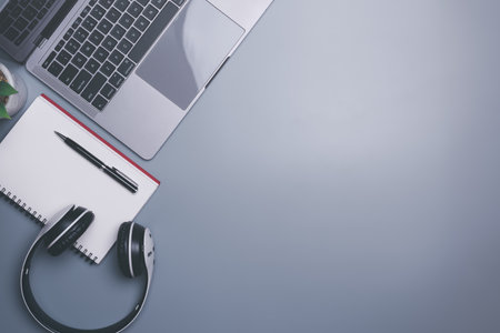 Headphones, notebooks, pens and laptops, Internet online education and learning concept, e-learning, learning new things, adding new career skills, personal development plan make business successful,の写真素材