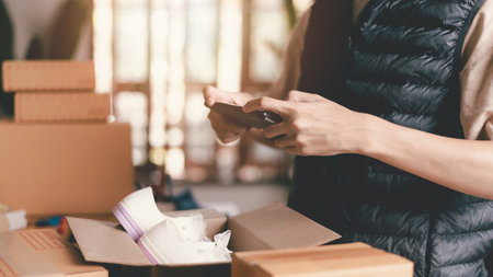 Startups or Small Business Entrepreneurs, Pack products for delivery, manage orders in online stores, shop online, sell online on the internet, SME ,ecommerce logistics service conceptの写真素材