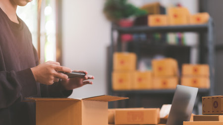 Startups or Small Business Entrepreneurs, Pack products for delivery, manage orders in online stores, shop online, sell online on the internet, SME, e-commerce,dropshipping delivery service conceptの写真素材