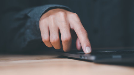 freelance typing with laptop computer ,wireless communication ,off-site work, online technology...