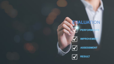 Businessman using a pen to point at an icon,result evaluation concept,plan review through...