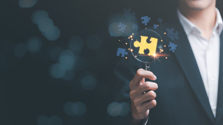 solution concept and leadership strategies,problem solution success,visionary decisions for success,finding a business solution,success and strategy concept,businessman holding a magnifying glassの写真素材