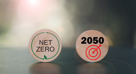 wooden blocks on the table,Net Zero and Carbon Neutral Concepts, a businessman in charge of green renewable energy technologies,save world,global warming campaign, green energyの写真素材