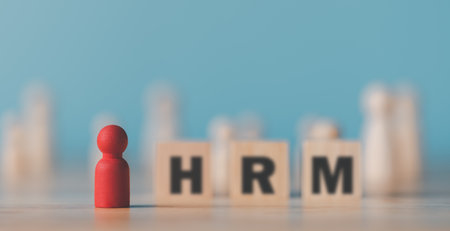 A wooden doll sits on the table,HRM or Human Resource Management,leadership in recruitment,Business development by choosing professional leaders employee competency teamwork,Taregt customerの写真素材