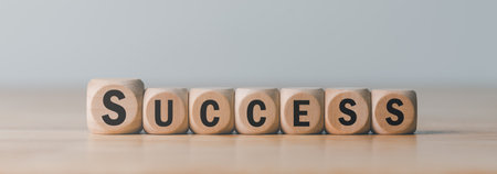 wooden blocks on table,concept of progress in development Financial efficiency and investment with business strategies for future goals and opportunities of the industry,business growth and successの写真素材