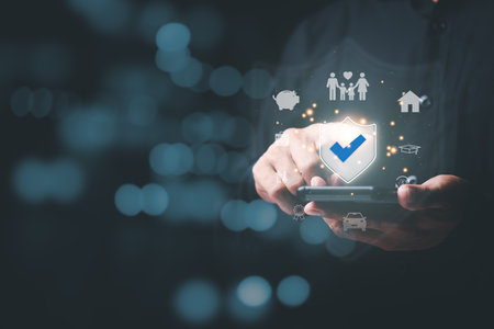 Hand holding a smartphone and pointing icon,Family and property safety concept,symbol of insurance,health and financial confidence,Protecting and caring for loved ones,Planning and Risk Managementの写真素材