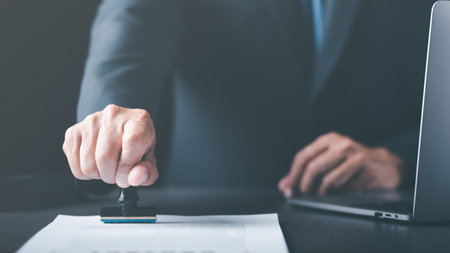 Businessman validates and manages business documents and agreements, signing a business contract...