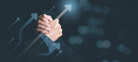 business people shaking hands indicating agreement business,concept progress in development, financial efficiency and investment with business strategy for goals and opportunities in industry futureの写真素材