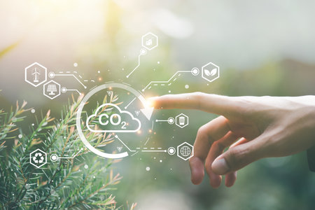 Industrial emissions pollute environment and ecology.including climate change,Carbon Reduction Agreement from Renewable Energy Reduce greenhouse gas emissions,Human hand, icon, and nature backgroundの写真素材