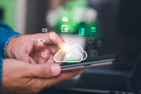 Human hand touches the smartphone, the concept of transferring, uploading, and downloading data,...