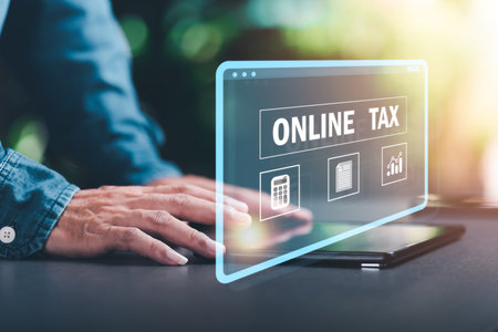 Businessman is managing documents online and calculating tax rates and business finance budget. Effective tax deduction planning ideas for individuals and companies. document management systemの写真素材