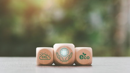 wooden blocks on table natural background,concept protecting environment alternative energy Sustainable renewable energy sources Green energy innovation and environmentally friendly energy technologyの写真素材