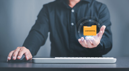Businessman holding icon in hand, confidential document protection concept, business data file...
