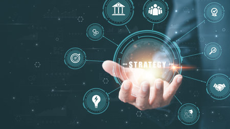 businessman holding strategy icon in hand,business planning ideas,goal setting,teamwork,Organizational Management for Leadership Development,Connecting Vision for Successの写真素材