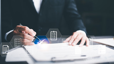 Business analytics consultants monitor the performance of various markets and operations through documentation, concepts of rules of conduct, rules and policies, corporate governance documents.の写真素材