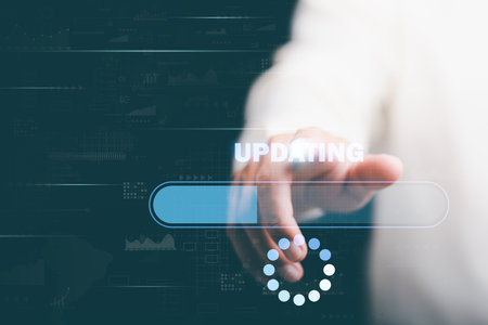 Man pushing software update button, technology information update and upgrade concept, online program installation, maintenance and process change, new interface refresh website.の写真素材