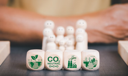 Industrial emissions pollute the environment and ecosystems. including climate change Carbon Renewable Energy Agreement reduce greenhouse gas emissions ,The wooden blocks are placed on the table.の写真素材