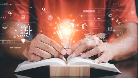 man holding light bulb,business invention innovation concept From creativity new ideas, intelligent technology development through imagination,brainstorming and cutting-edge information discovery.の写真素材