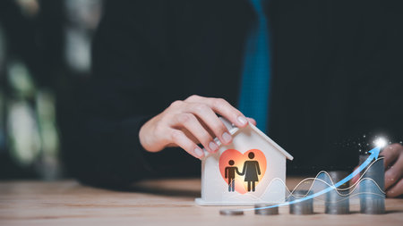 Family safety protection and protection concept ,Insurance management planning ,health care and finance ,property and family risk reduction ,Caring and caring for loved ones ,financial stabilityの写真素材