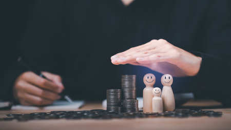 Family safety protection and protection concept ,Insurance management planning ,health care and finance ,property and family risk reduction ,Caring and caring for loved ones ,financial stabilityの写真素材
