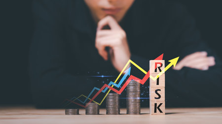 Businessman planning to manage investment risks and interest rates fluctuating from the global economy ,Financial risk management concept ,Fault protection ,Decisions on Business Opportunitiesの写真素材