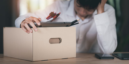 employees or unemployed holding a cardboard box ,Show termination concept ,resigned from a job, was fired or left a job ,recession problems ,bankruptcy in business ,quitting a job ,new career searchの写真素材