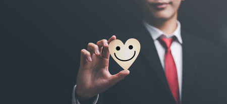 concept of showing love and satisfaction ,Caring and caring for loved ones ,life and property protection planning ,Insurance management planning ,health care and finance ,friendly smile, sincerityの写真素材