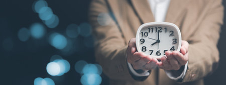 clock on businessman hand, time management concept ,effective business planning ,time management in organization ,Agreement and solution ,end of deal ,profitable use of time ,appointment punctualityの写真素材