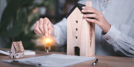 customer checking loan agreement with real estate agent ,Investment loan approval concepts to build residential homes, real estate business ,appraisal of property value ,Signing to approve contractの写真素材