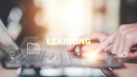 concept of education adds new skills ,business education ,professional courses ,Young businessman taking notes and information from learning new things in professional seminar ,e-learningの写真素材