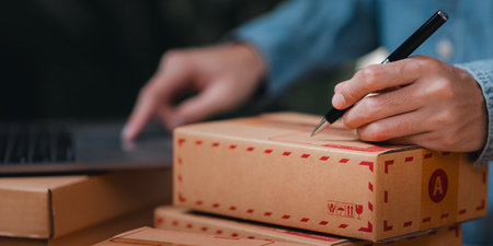 concept of selling products online ,order management in online stores, shopping on the internet ,Selling online on the Internet ,Write shipping address from customer ,order in online store ,SMEの写真素材