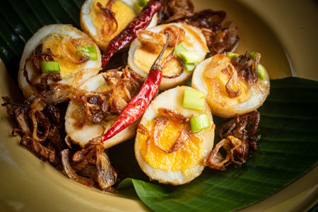 Fried boiled egg with tamarind sauce (Son-in-law Eggs), Close-up imageの写真素材