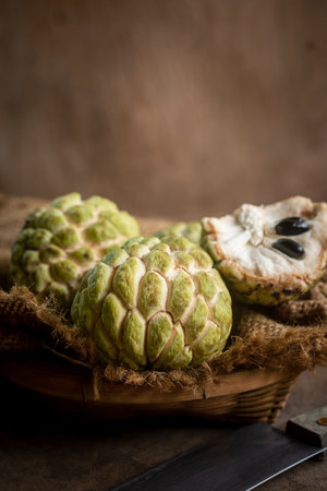 Custard Apple on old wood, vintage still life style image.