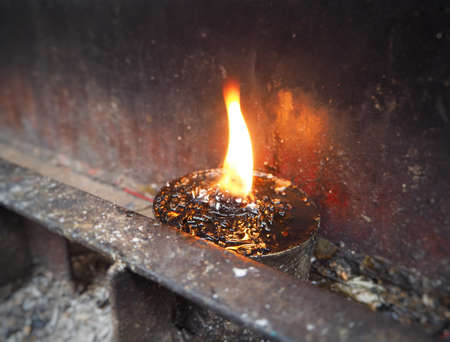 Flame for Incense sticks in Templeの写真素材