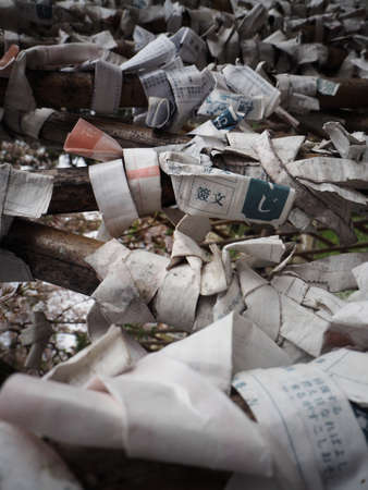 Blessing Paper at Japan Templeの写真素材