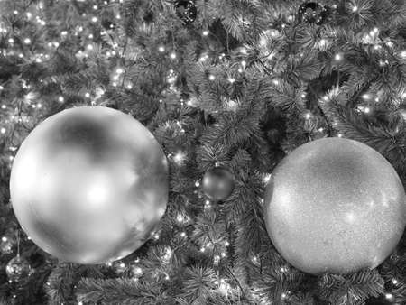 Many gold and red ornament shiny ball on Green Christmas tree. Can use for background and add text.の写真素材