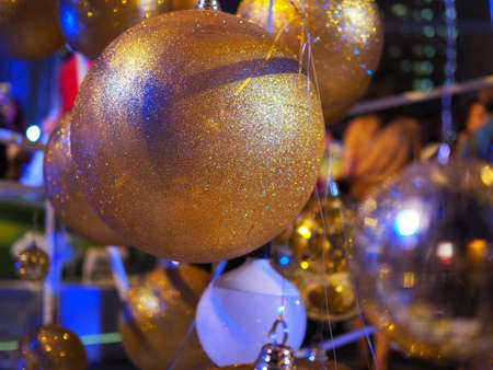 Many Golden balls in Christmas Event . With blur background and have copy space to add your text.の写真素材