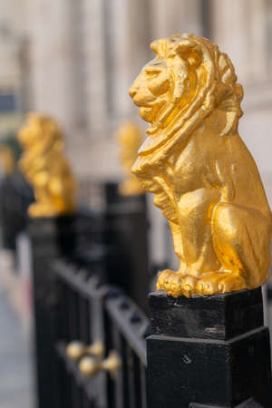 Gilded golden lions sitting on top of the metal railings outside the Law Society at Chancery Lane, London, England - 2のeditorial素材