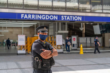 LONDON, ENGLAND - JULY 3, 2020:  Social Distancing being practiced by train passengers during the...