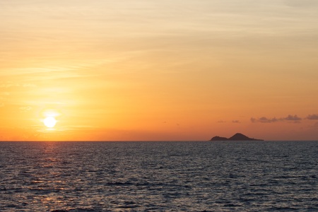 Amazing tropical sunset over the Indian Ocean between Praslin and Mahe islands, Seychellesの写真素材
