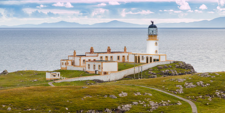 Lighthouse on the cliffs of Neist Point, a famous landmark near Glendale, Isle of Skye, Scotlandの写真素材